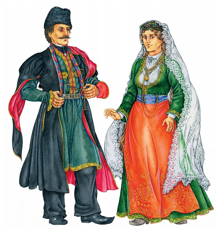 Мужчина и женщина в старинных праздничных костюмах