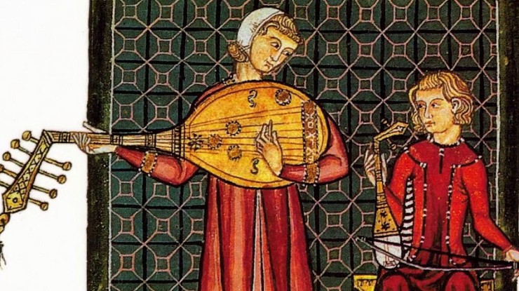 Музыканты, играющие на жиге и гитерне. С миниатюры XV в.