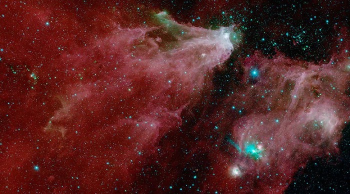 Процесс формирования звезд в созвездии Орион, сфотографированный в инфракрасном диапазоне телескопом «Спитцер»