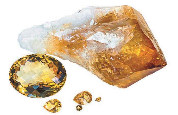 Кристалл кварца — цитрина и ограненные камни